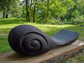 singed oakwood, metal; 35 x 90 x 60 cm; 2009