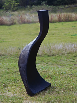 singed oakwood, metal; 140 x 70 x 60 cm; 2009